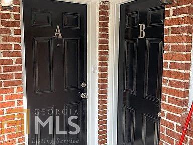 2617 Sylvan Road, Unit A & B East Point, GA 30344 - Photo 1 of 1 a view of a door and brick wall