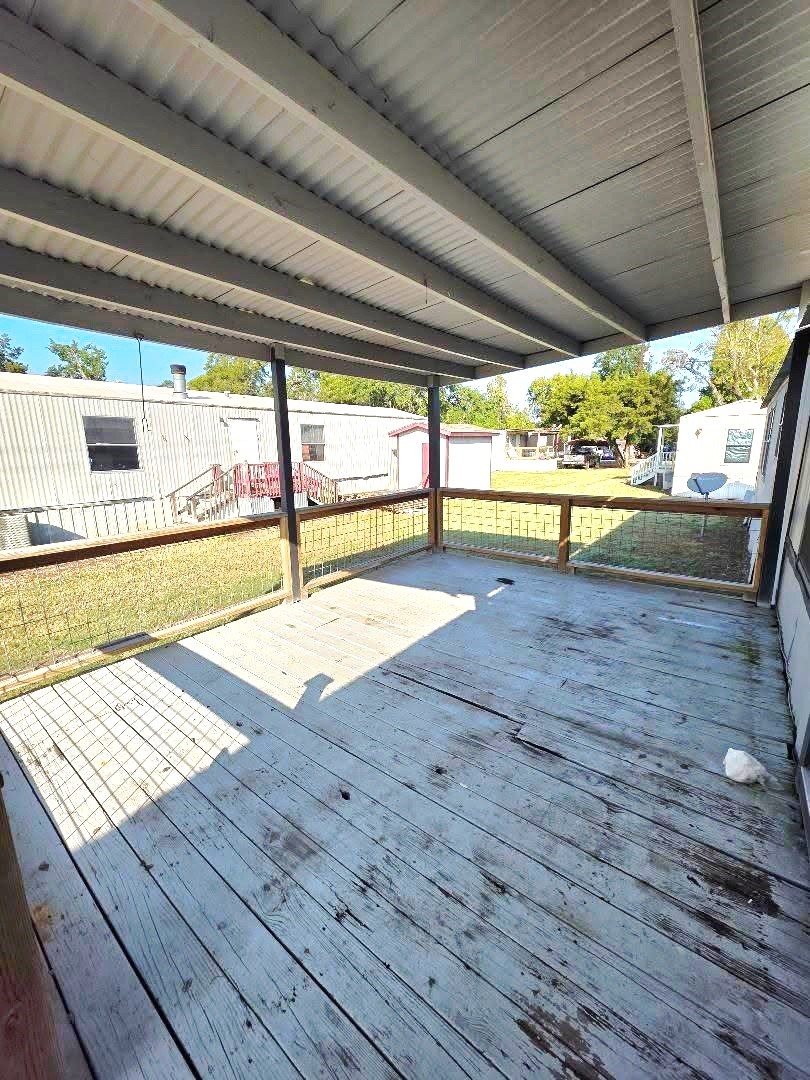 310 Paddock Street, Unit 5 Willis, TX 77378 - Photo 2 of 12 a view of a room with wooden floor