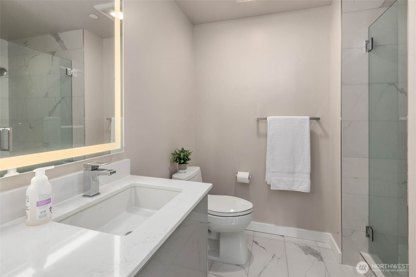 450 South Main Street, Unit 806 Seattle, WA 98104 - Photo 11 of 25 a bathroom with a sink and a toilet
