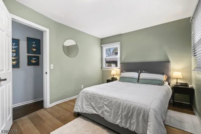 a bedroom with a bed and closet