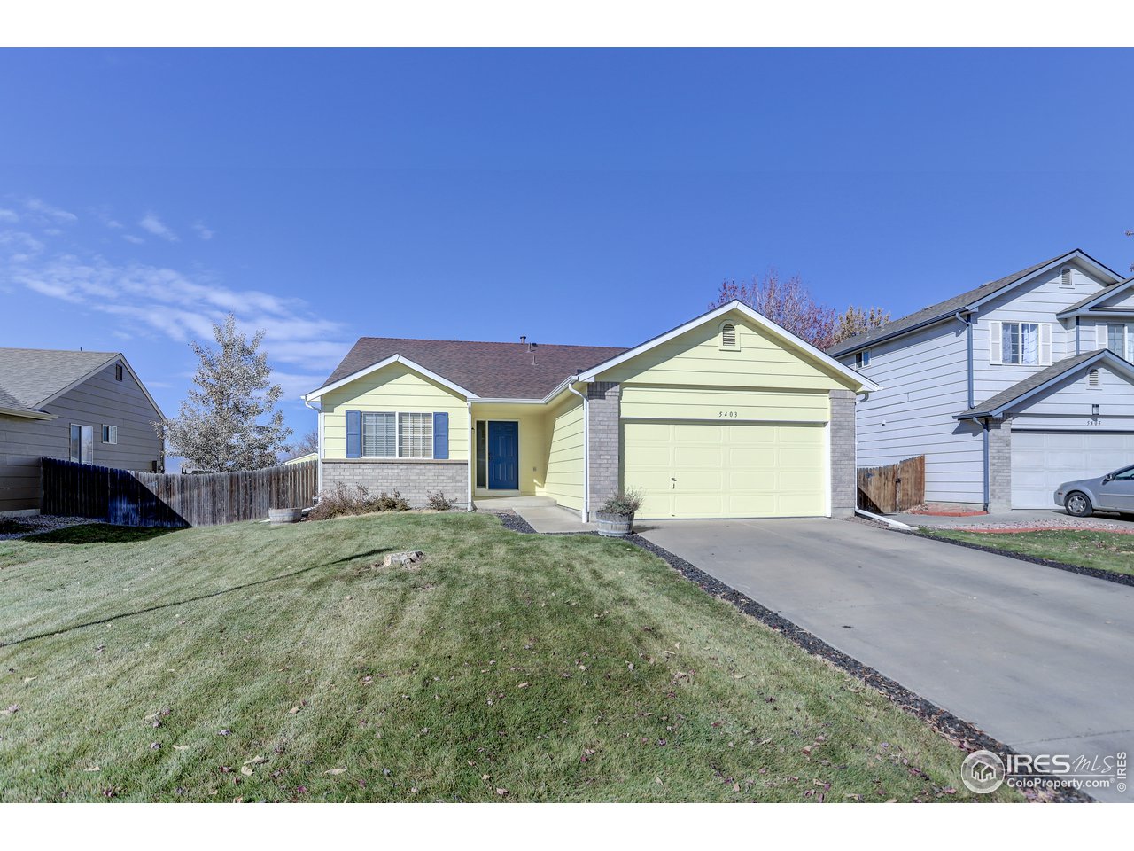 5403 Bobcat Street Frederick, CO 80504 - Photo 2 of 40 a house view with a garden space