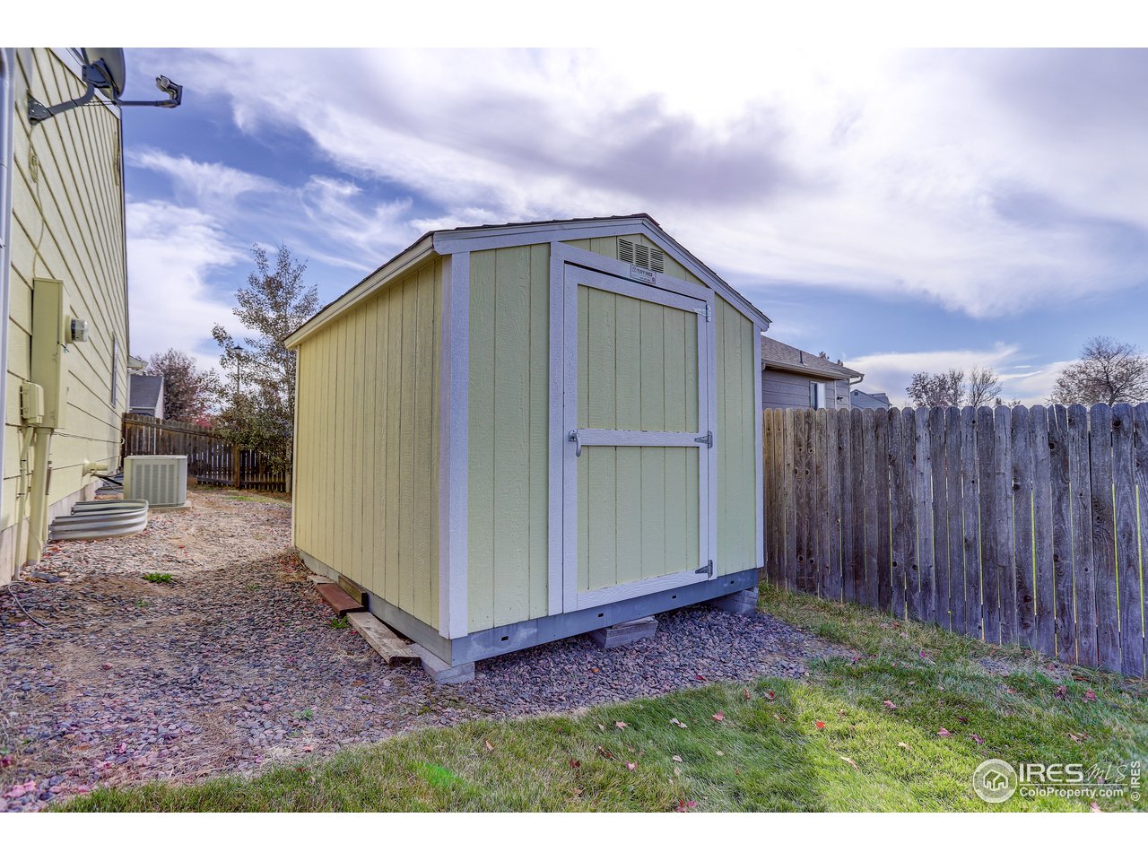 5403 Bobcat Street Frederick, CO 80504 - Photo 35 of 40 a view of backyard with tub