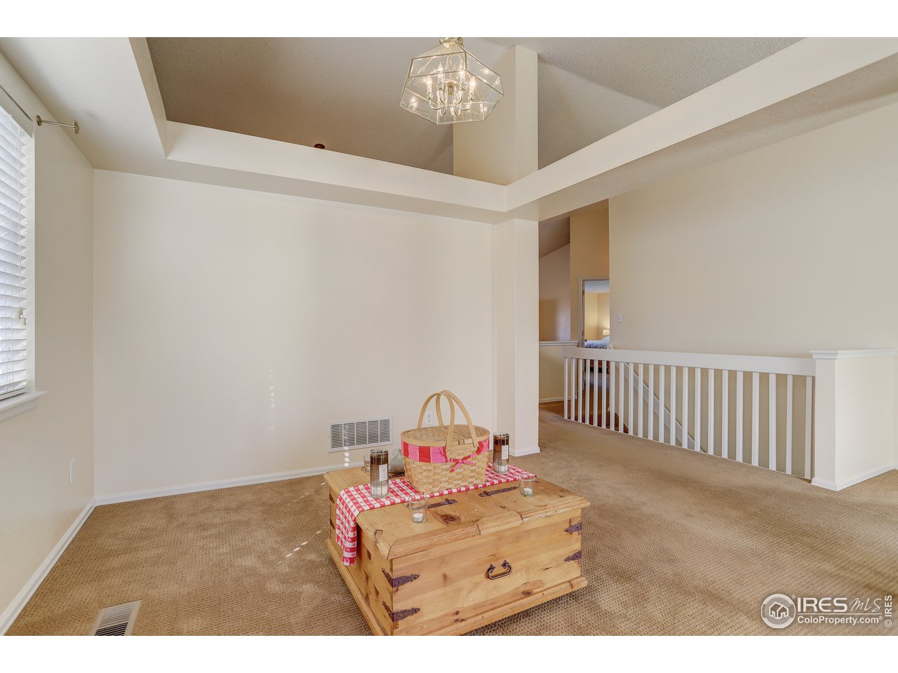 5403 Bobcat Street Frederick, CO 80504 - Photo 6 of 40 a bedroom with a bed and a window