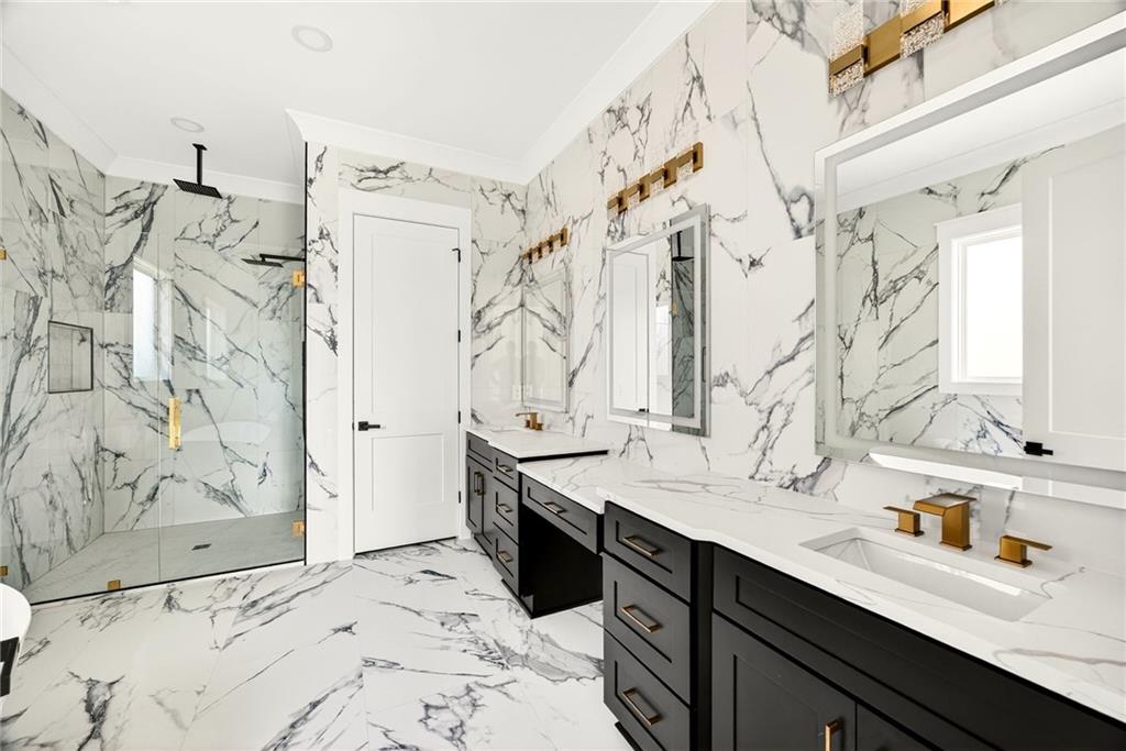403 Thunder Road Buford, GA 30518 - Photo 66 of 88 a bathroom with a double vanity sink mirror and shower