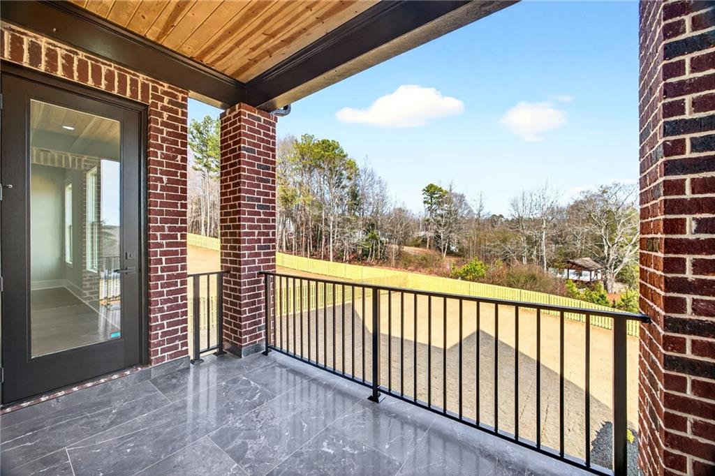 403 Thunder Road Buford, GA 30518 - Photo 81 of 88 a view of a balcony with an outdoor space