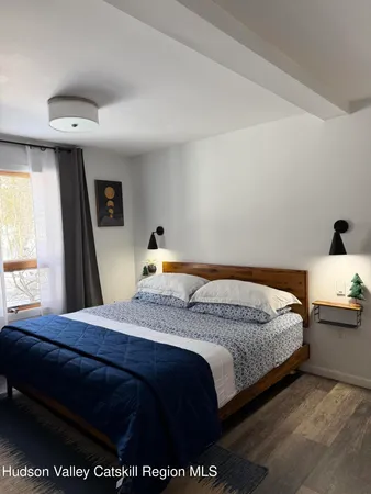 a bathroom with a toilet sink and vanity