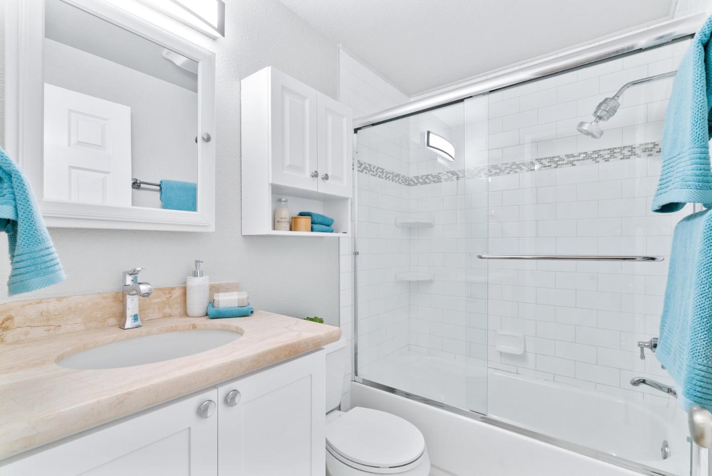 280 Easy Street, Unit 403 Mountain View, CA 94043 - Photo 14 of 21 a bathroom with a sink a toilet and shower