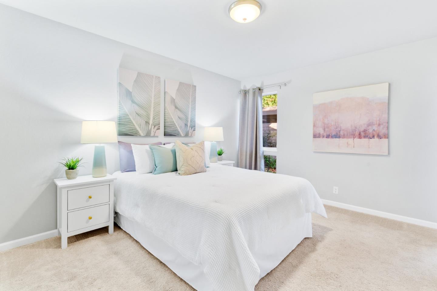 280 Easy Street, Unit 403 Mountain View, CA 94043 - Photo 16 of 21 a bedroom with a bed and a window