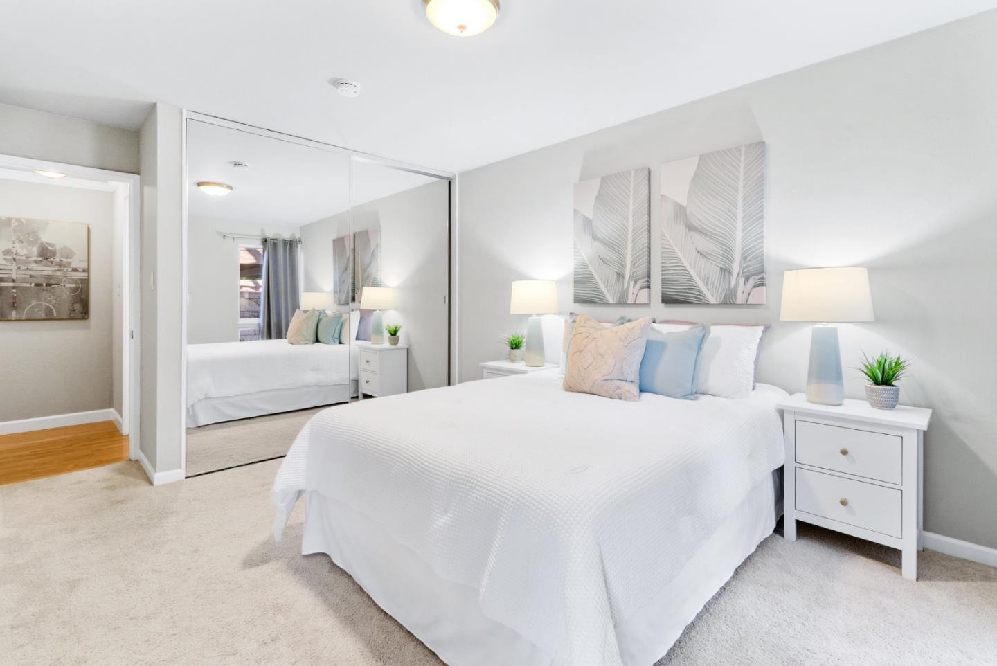 280 Easy Street, Unit 403 Mountain View, CA 94043 - Photo 17 of 21 a bedroom with a bed and a couch