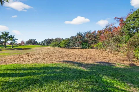 a view of a lake with a big yard