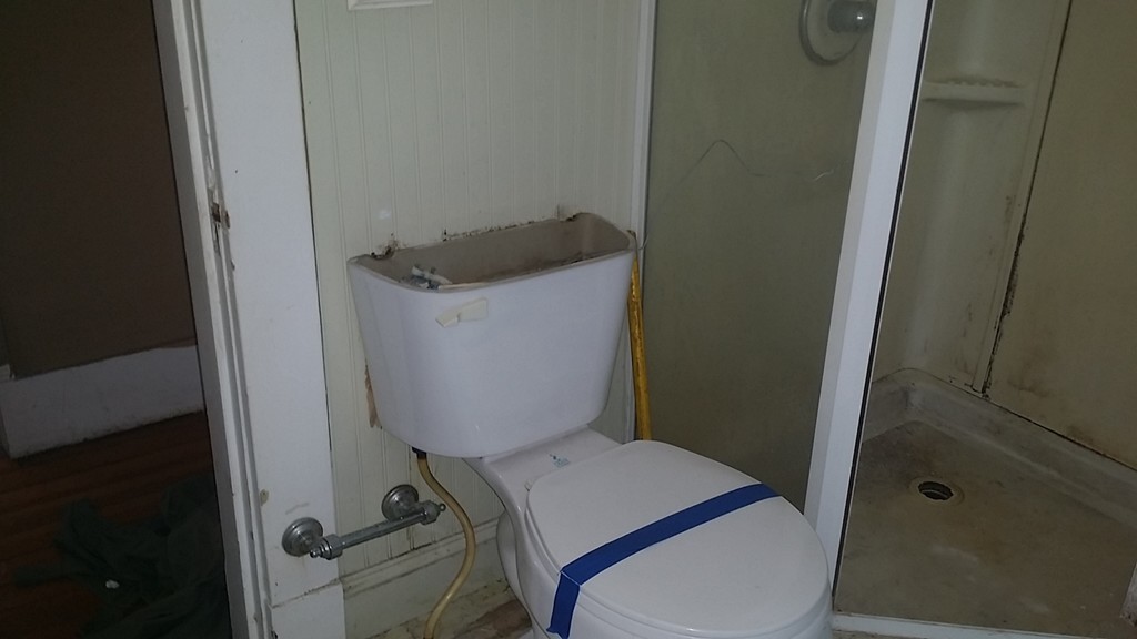 82 Miller Street Springfield, MA 01104 - Photo 8 of 8 a bathroom with a toilet and a sink