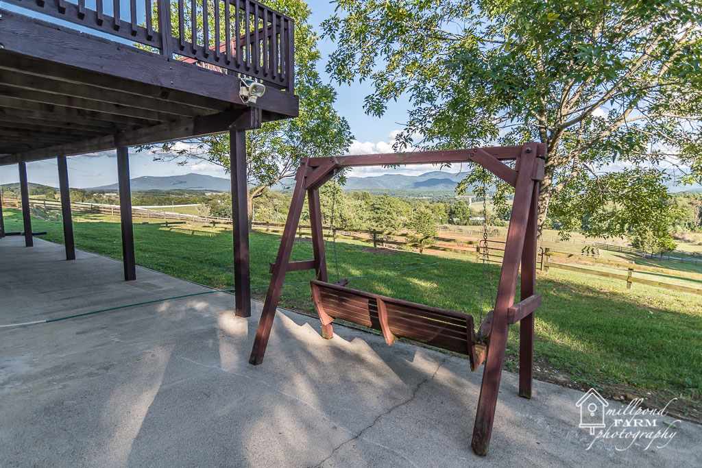 201 East View Lane Raphine, VA 24472 - Photo 12 of 50 a view of a wooden deck with a yard