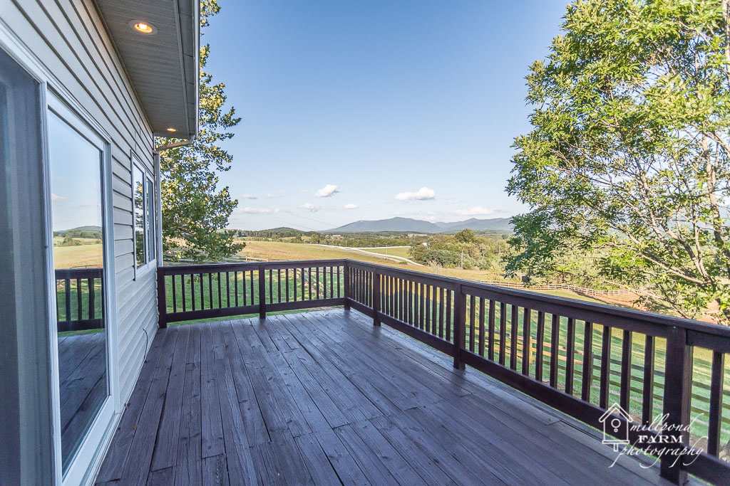 201 East View Lane Raphine, VA 24472 - Photo 15 of 50 a view of a balcony with wooden floor