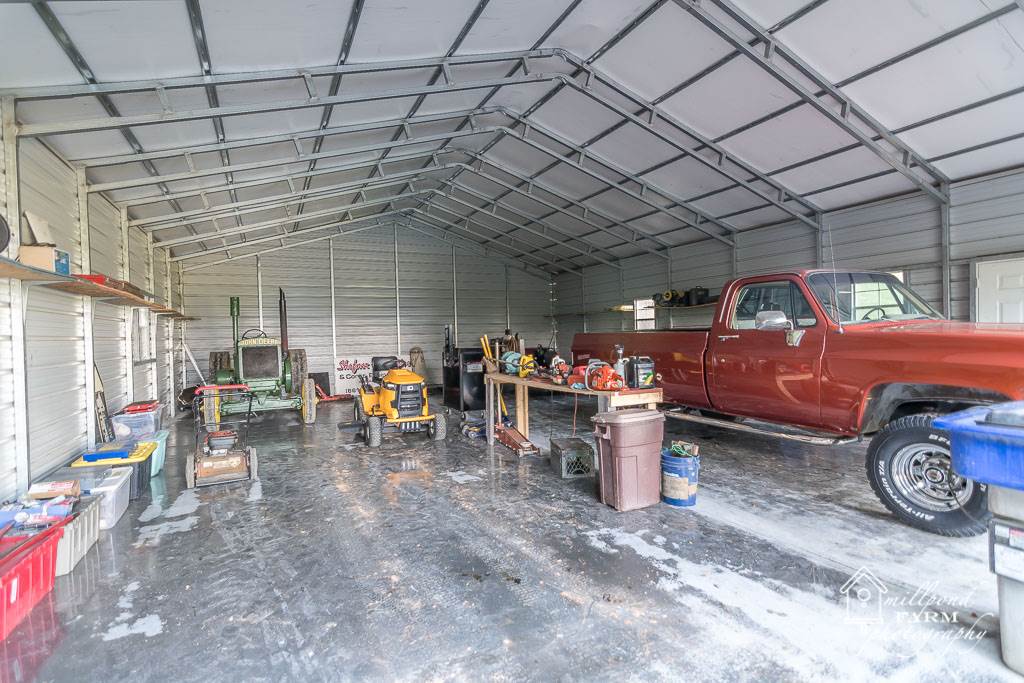 201 East View Lane Raphine, VA 24472 - Photo 19 of 50 a view of a garage with parked cars