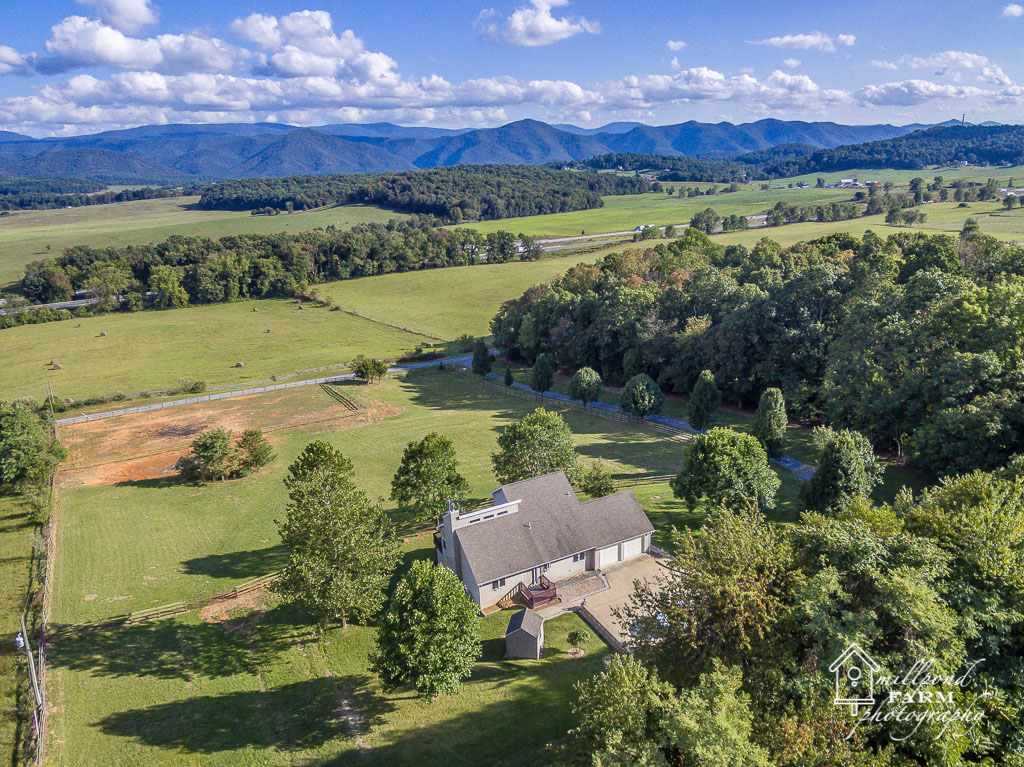 201 East View Lane Raphine, VA 24472 - Photo 4 of 50 an aerial view of a houses with a yard and lake view