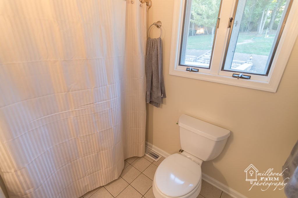 201 East View Lane Raphine, VA 24472 - Photo 50 of 50 a white toilet sitting next to a bathroom