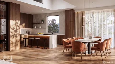 a kitchen with stainless steel appliances kitchen island granite countertop a table chairs and a refrigerator