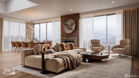 a living room with furniture a large window and a chandelier