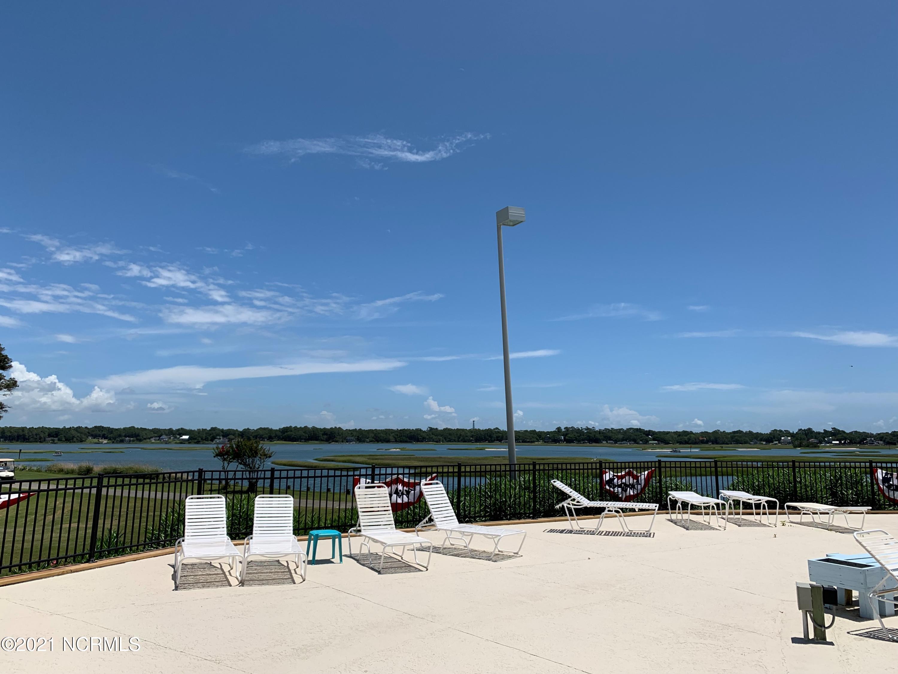 511 Genoe's Point Road Southwest Supply, NC 28462 - Photo 12 of 17 Lockwood Folly pool view