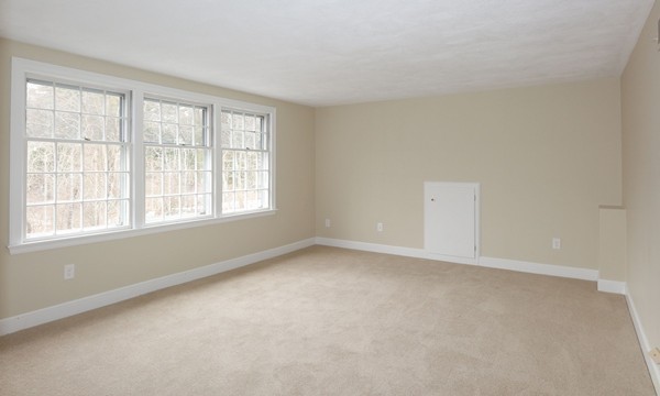 17 Aspen Road Weston, MA 02493 - Photo 17 of 27 an empty room with a window