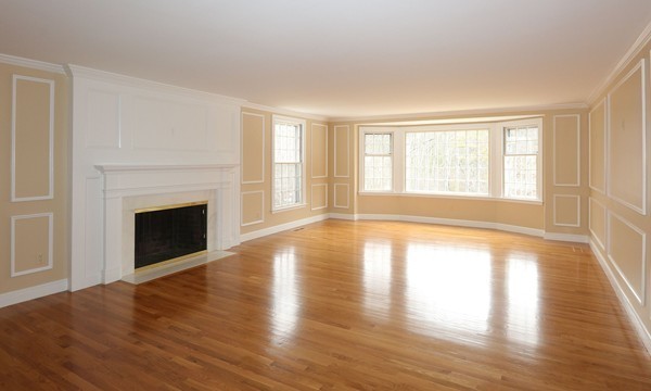 17 Aspen Road Weston, MA 02493 - Photo 4 of 27 a view of an empty room with window and wooden floor