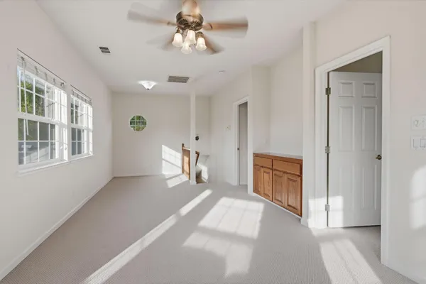 an aerial view of house with yard swimming pool and outdoor seating
