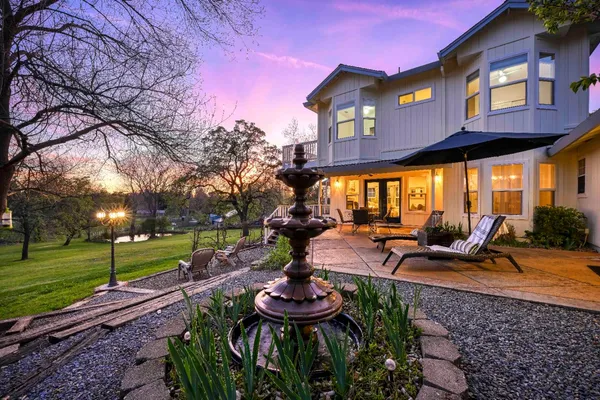 a view of a house with a big yard