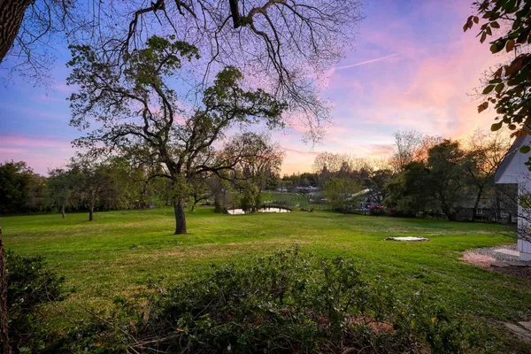 a living room with furniture and windows