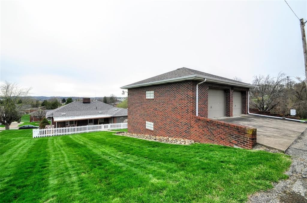 65 Cort Street Washington, PA 15301 - Photo 18 of 49 a backyard of a house with table and chairs