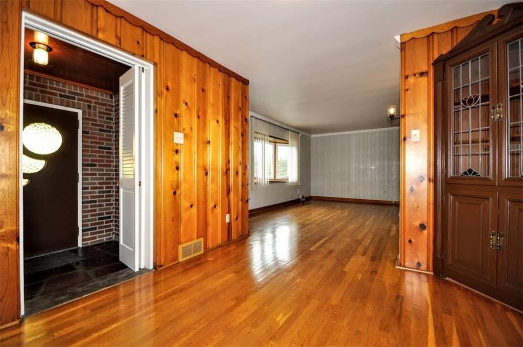 65 Cort Street Washington, PA 15301 - Photo 23 of 49 a view of a hallway with wooden floor and staircase