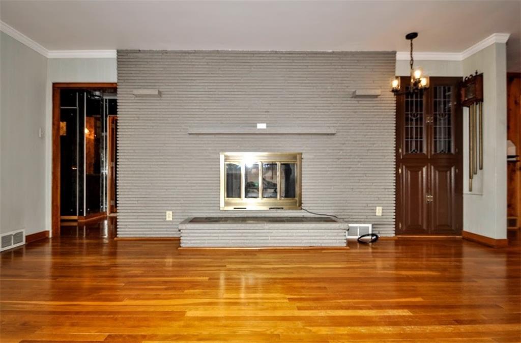 65 Cort Street Washington, PA 15301 - Photo 24 of 49 a view of a living room with furniture and floor to ceiling window