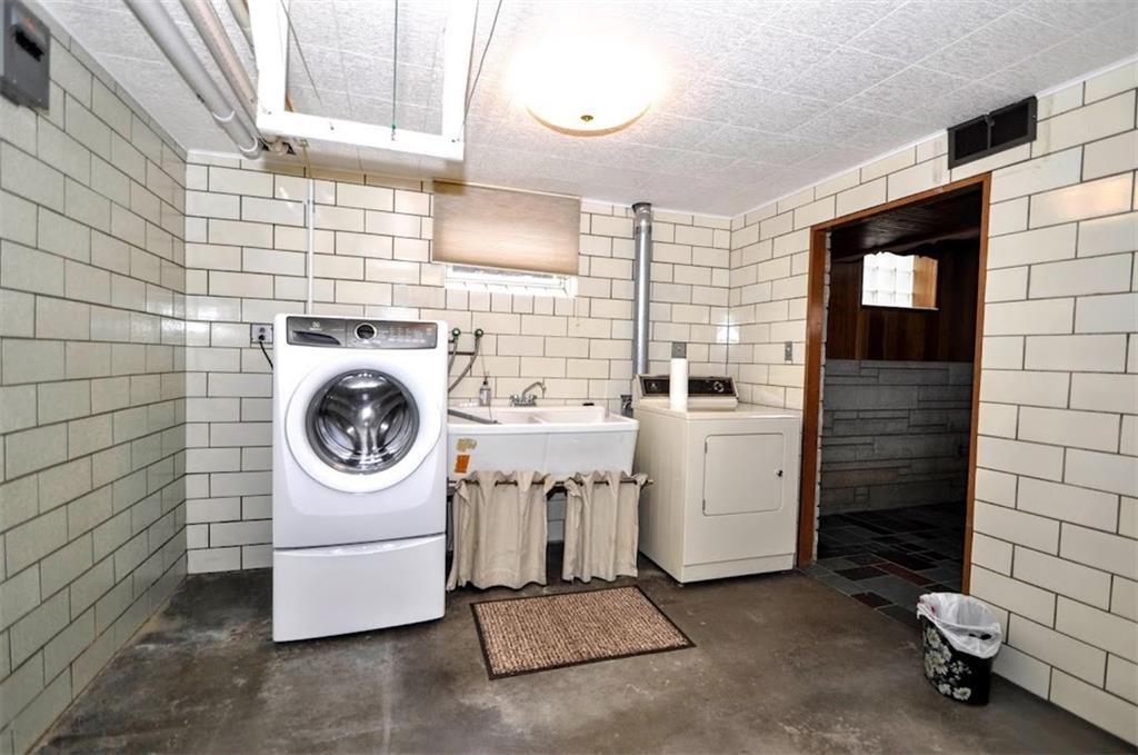 65 Cort Street Washington, PA 15301 - Photo 47 of 49 a utility room with dryer and washer