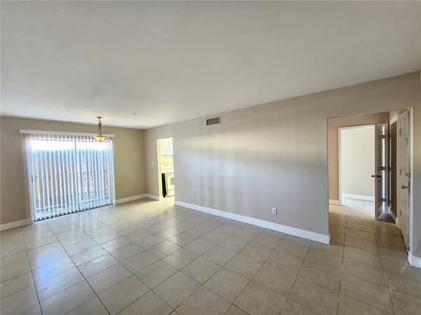 en empty room with windows