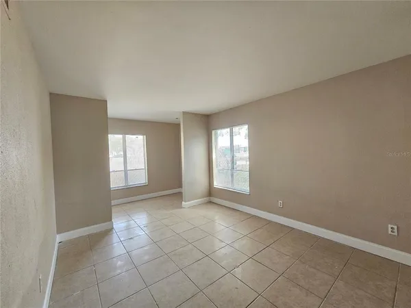 a view of an empty room with window