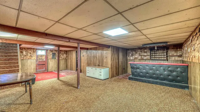 a view of an empty room with glass door