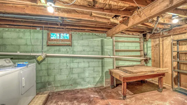 a view of an empty room with a wooden roof