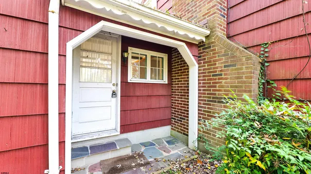 a front view of a house with a garage