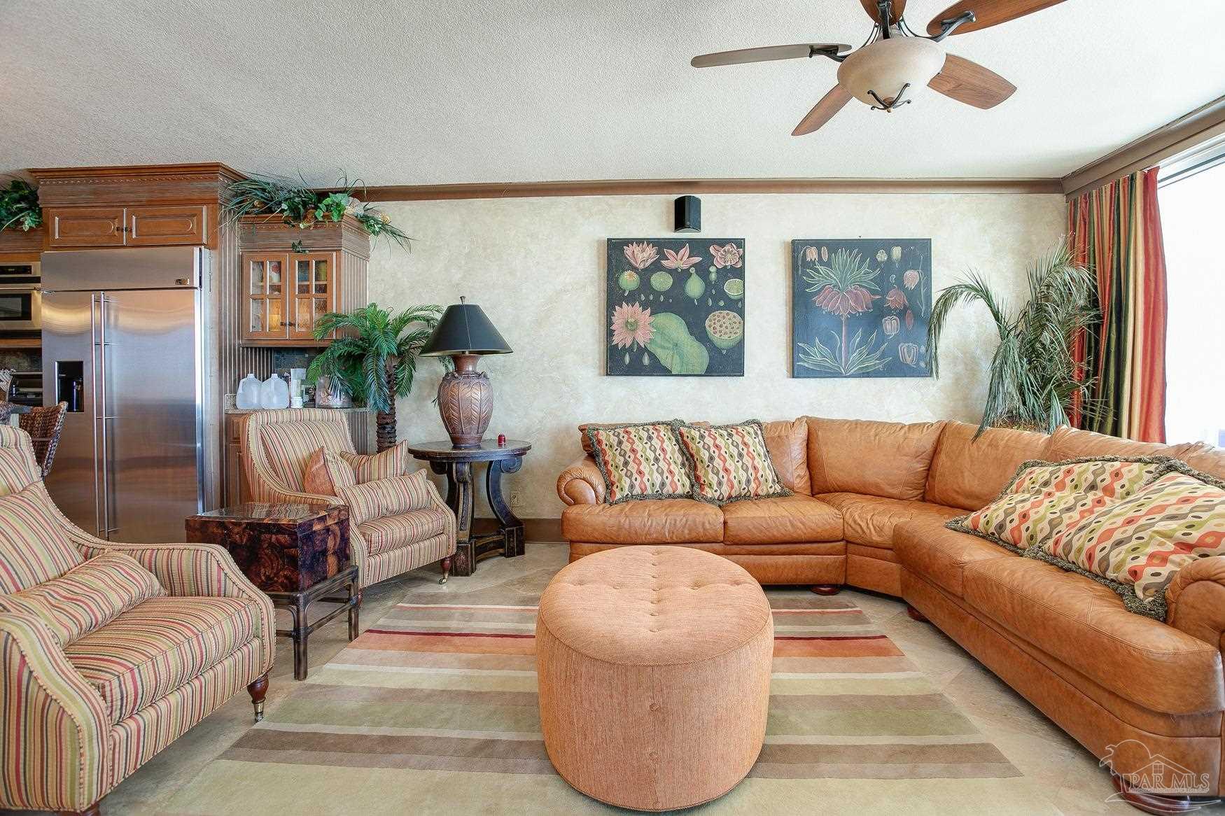 16795 Perdido Key Drive, Unit 40304B Perdido Key, FL 32507 - Photo 11 of 42 a living room with furniture and a large window