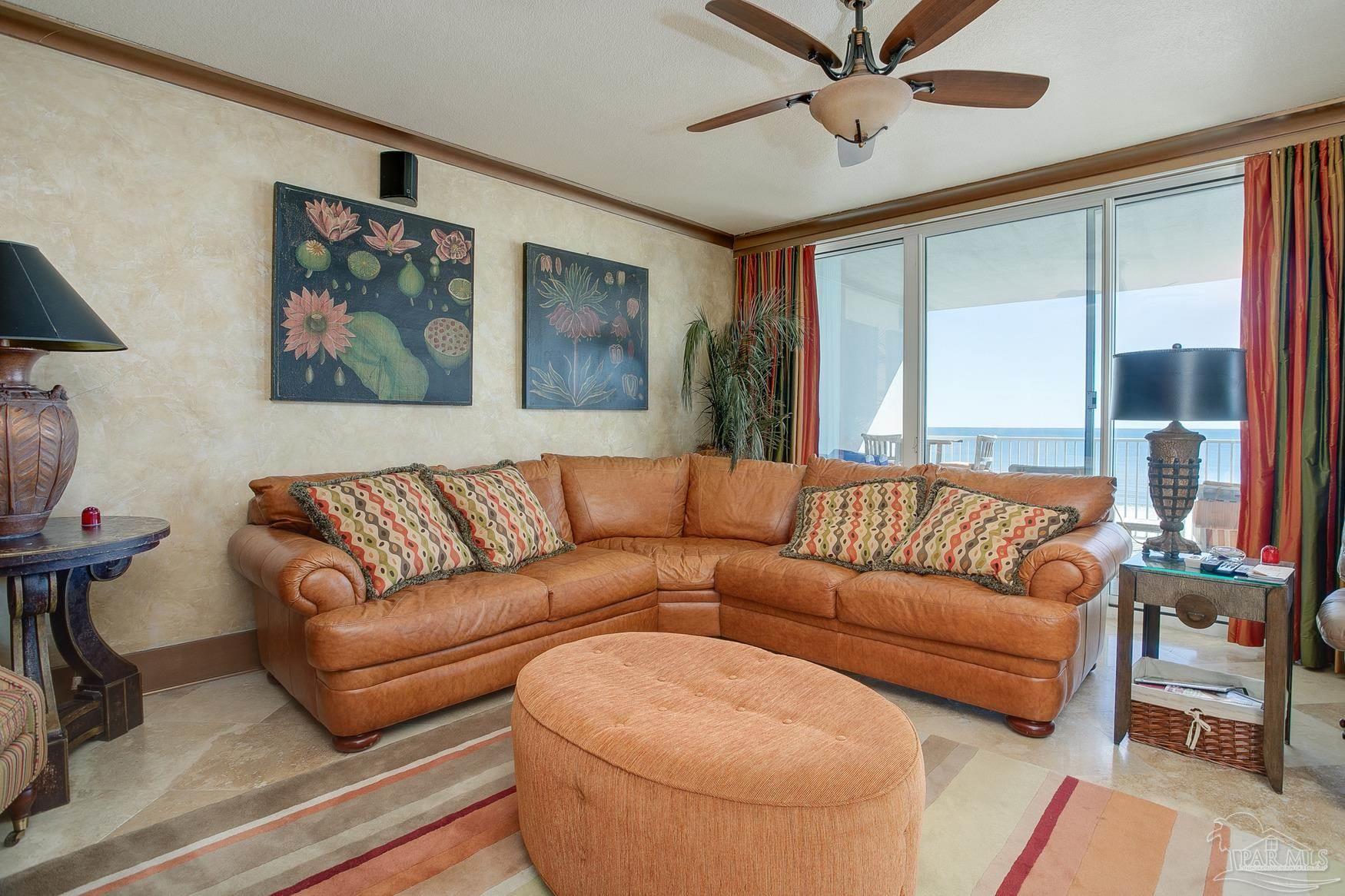 16795 Perdido Key Drive, Unit 40304B Perdido Key, FL 32507 - Photo 12 of 42 a living room with furniture and a large window