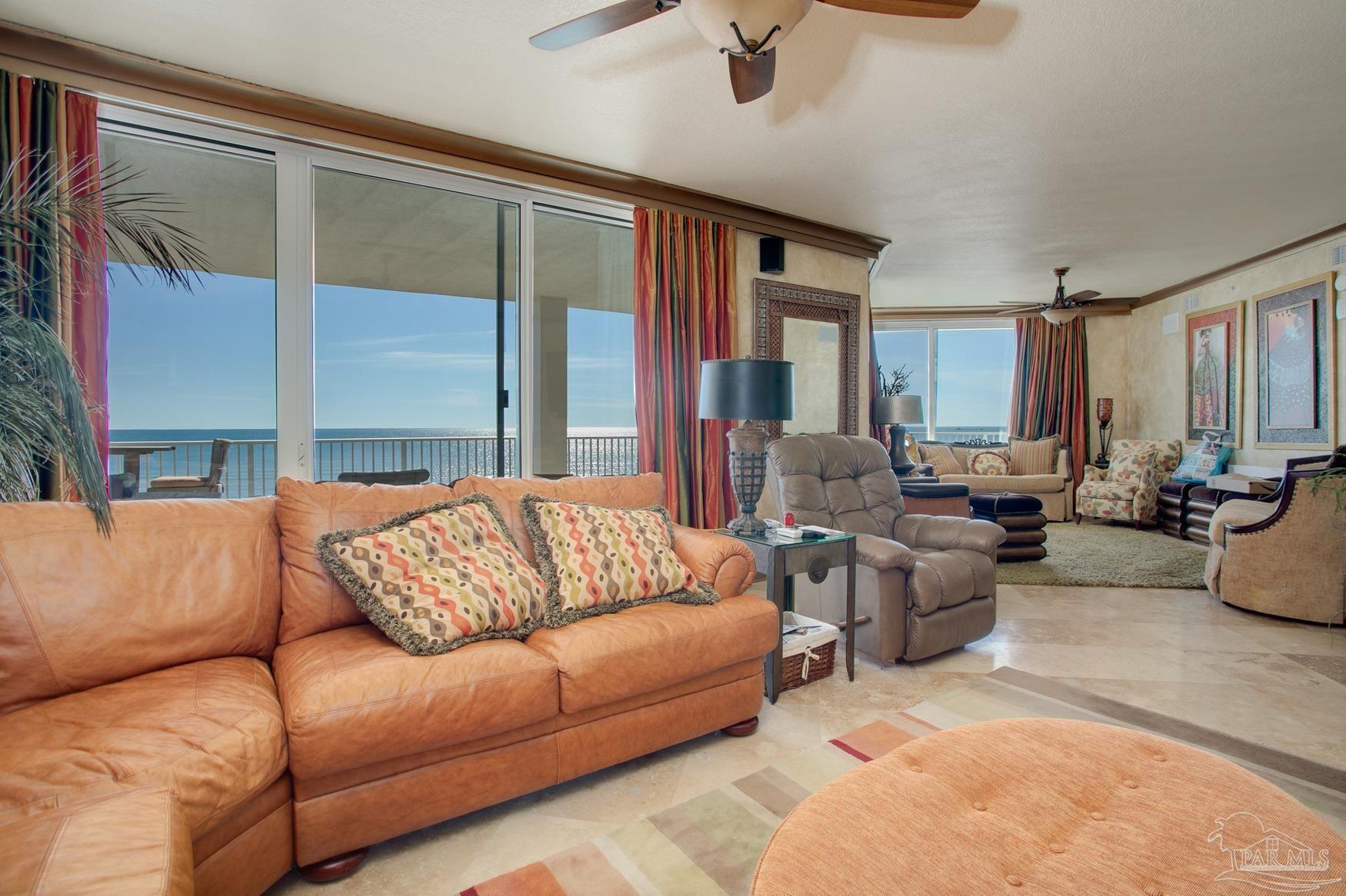 16795 Perdido Key Drive, Unit 40304B Perdido Key, FL 32507 - Photo 13 of 42 a living room with furniture and a large window