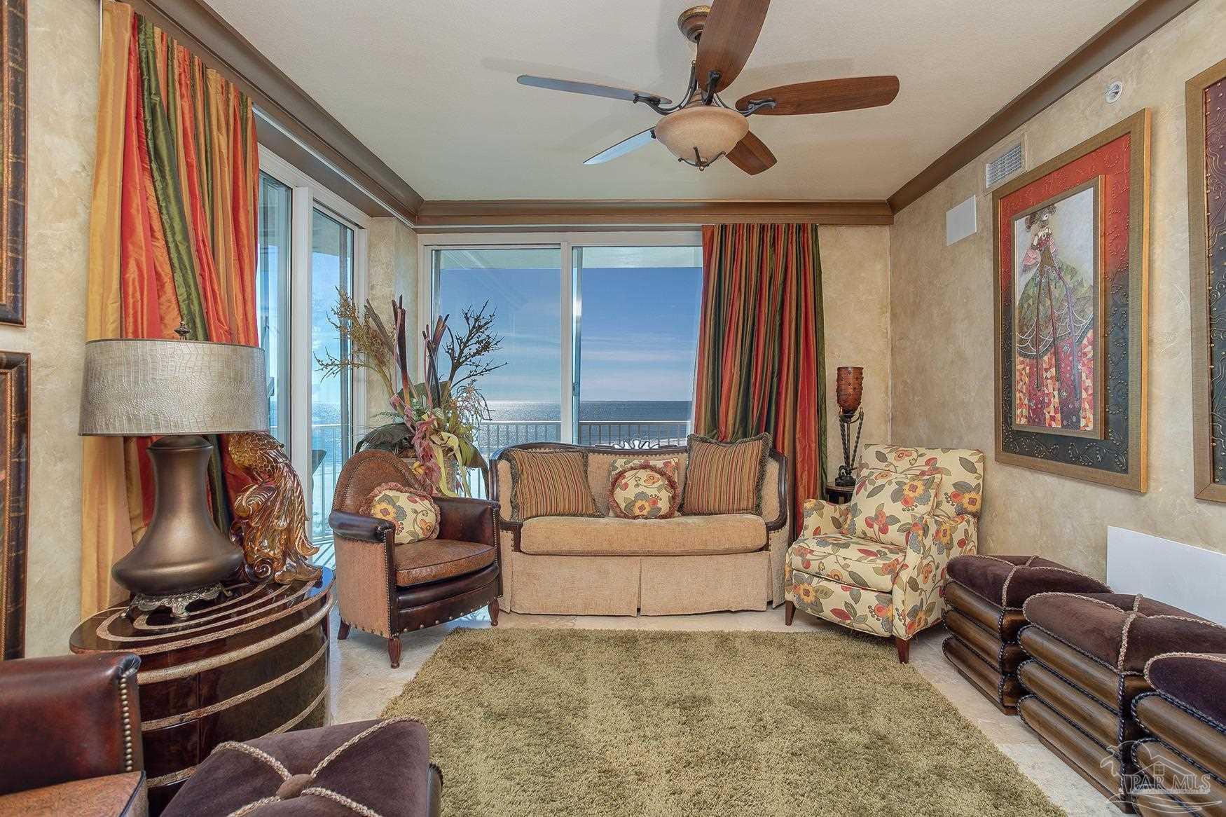 16795 Perdido Key Drive, Unit 40304B Perdido Key, FL 32507 - Photo 14 of 42 a living room with furniture and a window