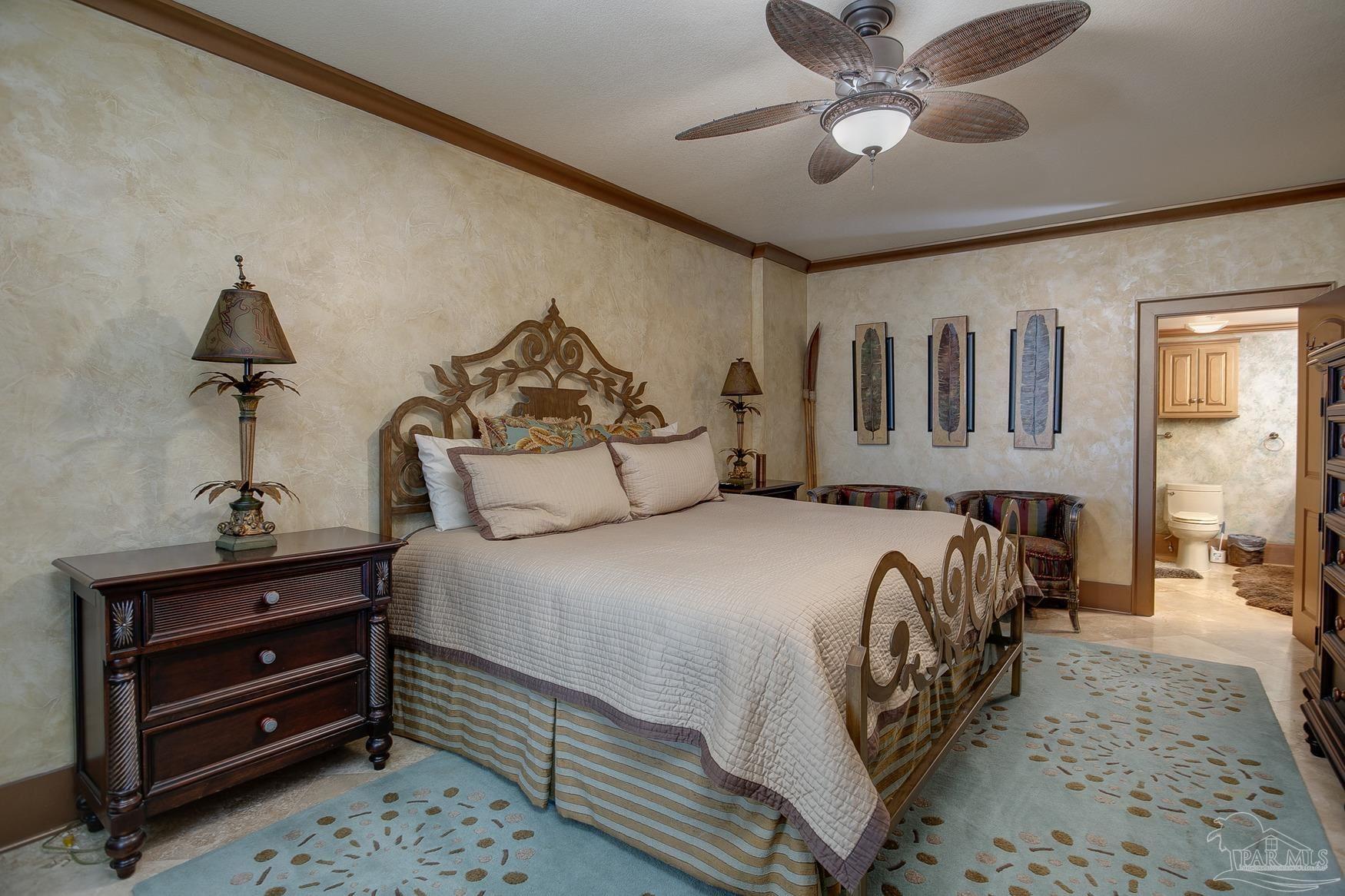 16795 Perdido Key Drive, Unit 40304B Perdido Key, FL 32507 - Photo 15 of 42 a bedroom with a bed and wooden floor