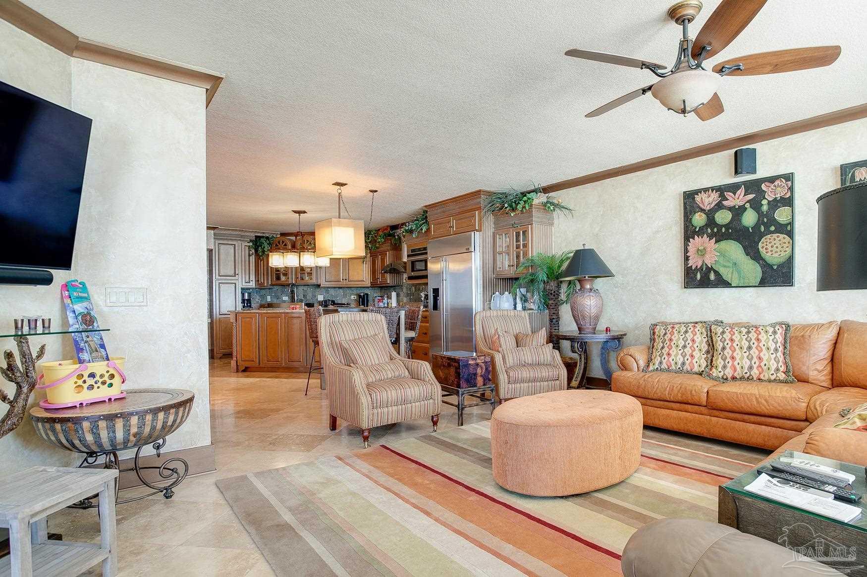 16795 Perdido Key Drive, Unit 40304B Perdido Key, FL 32507 - Photo 20 of 42 a living room with furniture and a flat screen tv