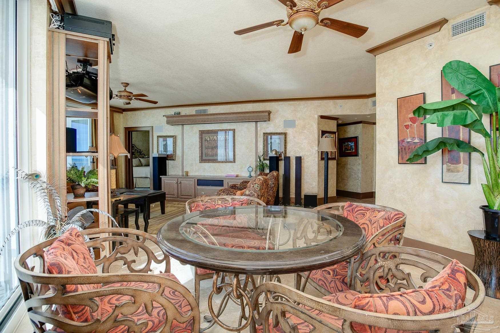 16795 Perdido Key Drive, Unit 40304B Perdido Key, FL 32507 - Photo 21 of 42 a view of a dining room with furniture