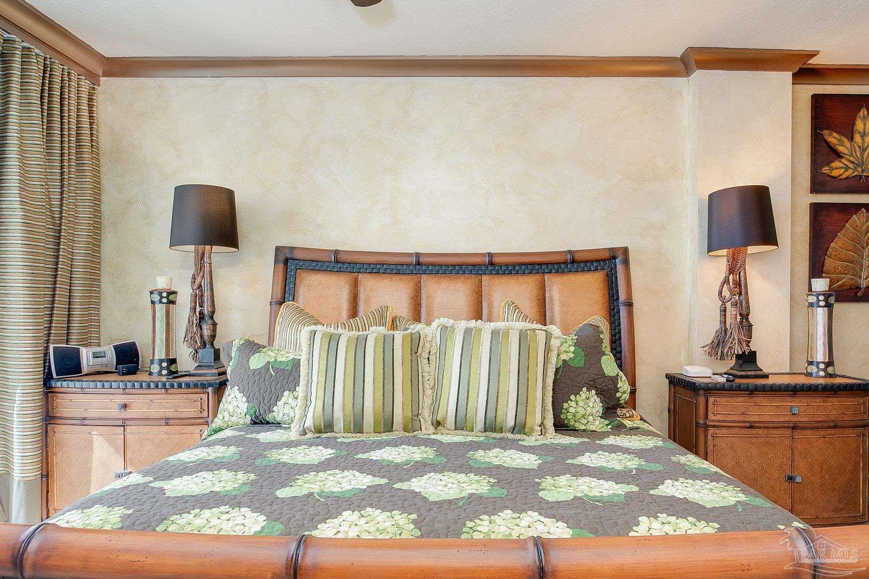 16795 Perdido Key Drive, Unit 40304B Perdido Key, FL 32507 - Photo 32 of 42 a bedroom with a bed and painting on the wall