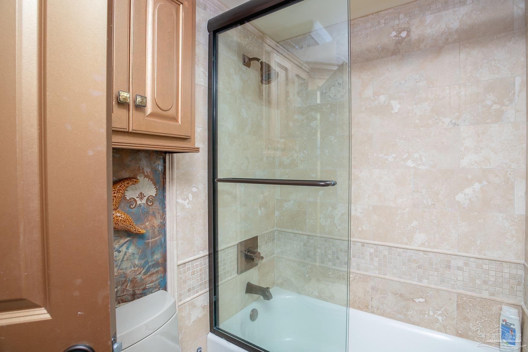 16795 Perdido Key Drive, Unit 40304B Perdido Key, FL 32507 - Photo 42 of 42 a bathroom with a bathtub and shower