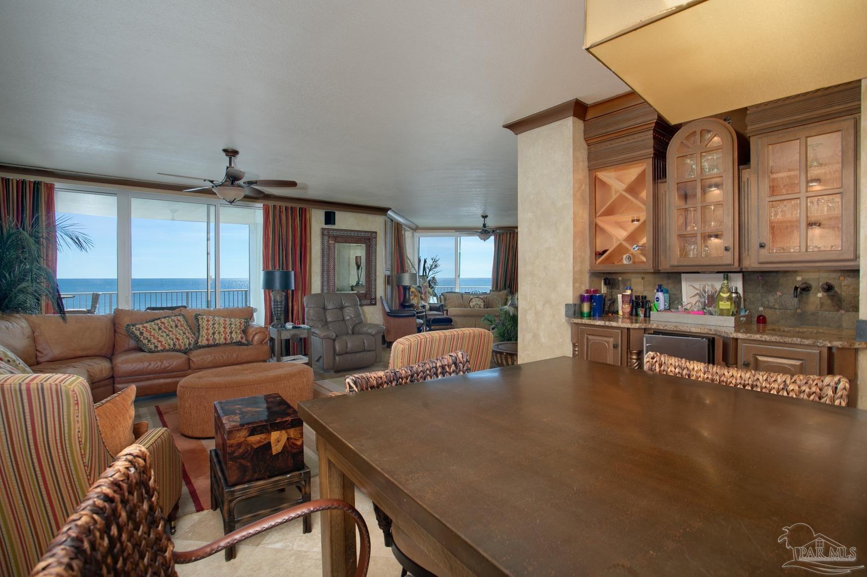 16795 Perdido Key Drive, Unit 40304B Perdido Key, FL 32507 - Photo 10 of 42 a living room with furniture and a large window
