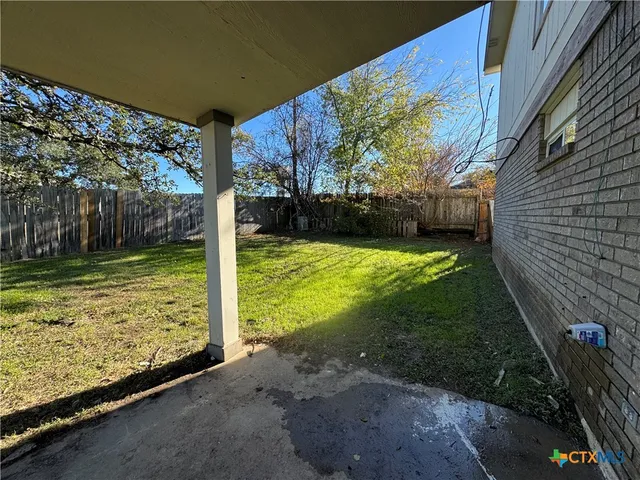 a view of a backyard with garden
