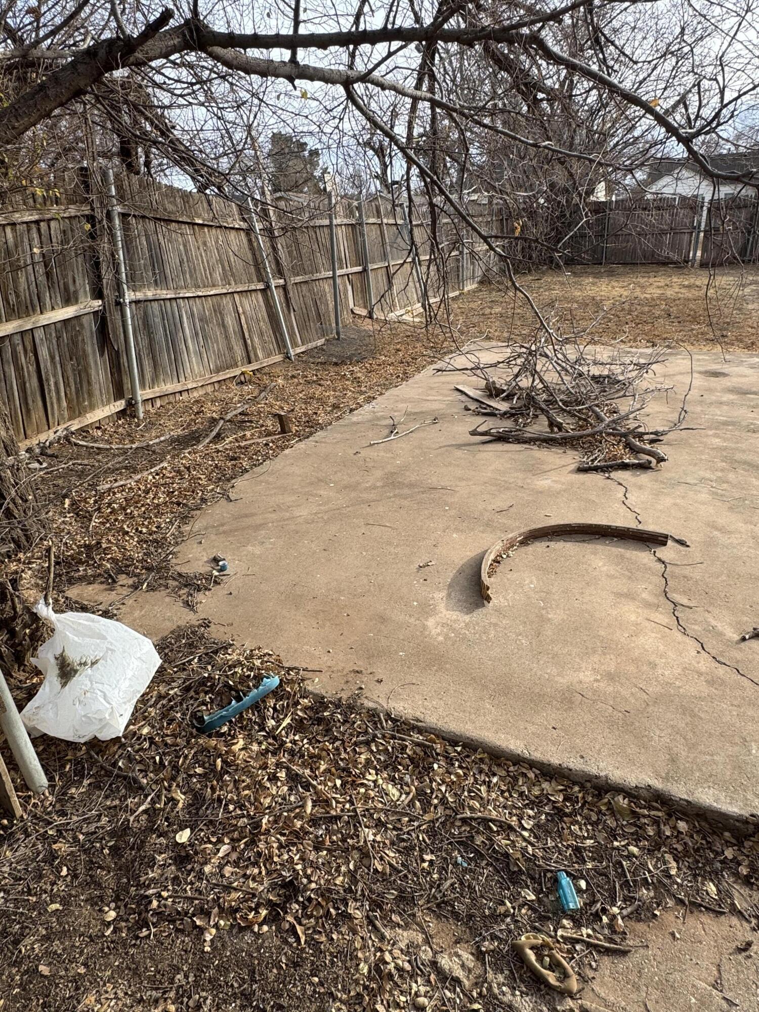 2119 26th Street Lubbock, TX 79411 - Photo 14 of 15 a view of a backyard of the house