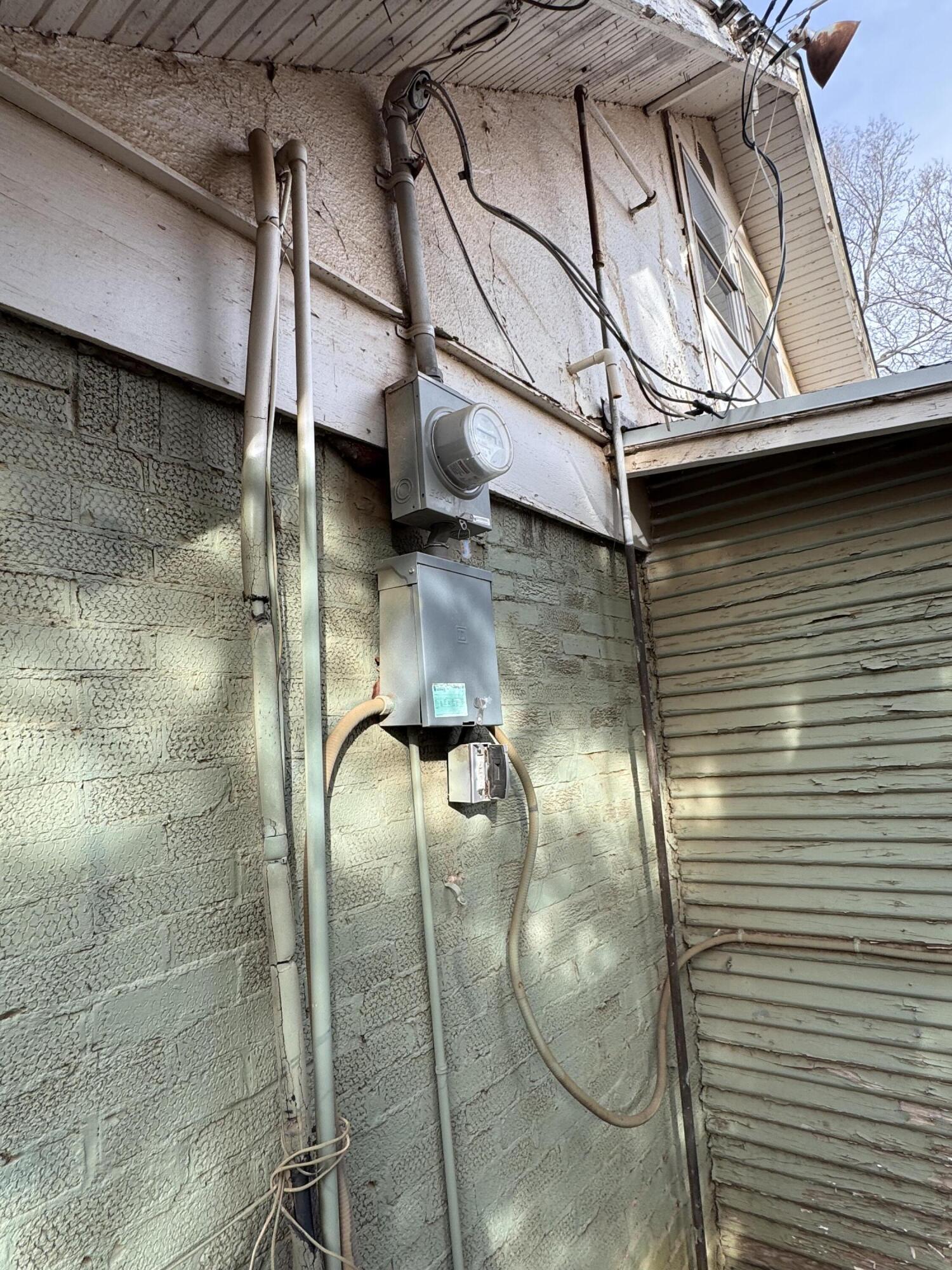 2119 26th Street Lubbock, TX 79411 - Photo 10 of 15 a water heater on a wall